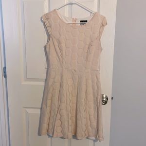 Light pink Asymmetric Dress.  Size 10 with zipper back.